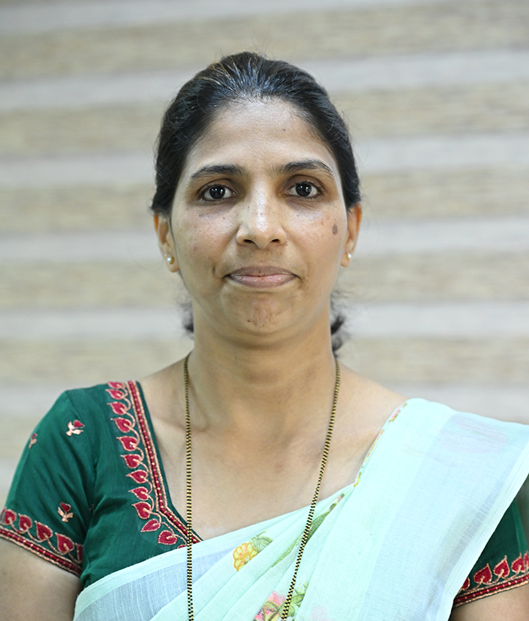 Ms Janet Pinto